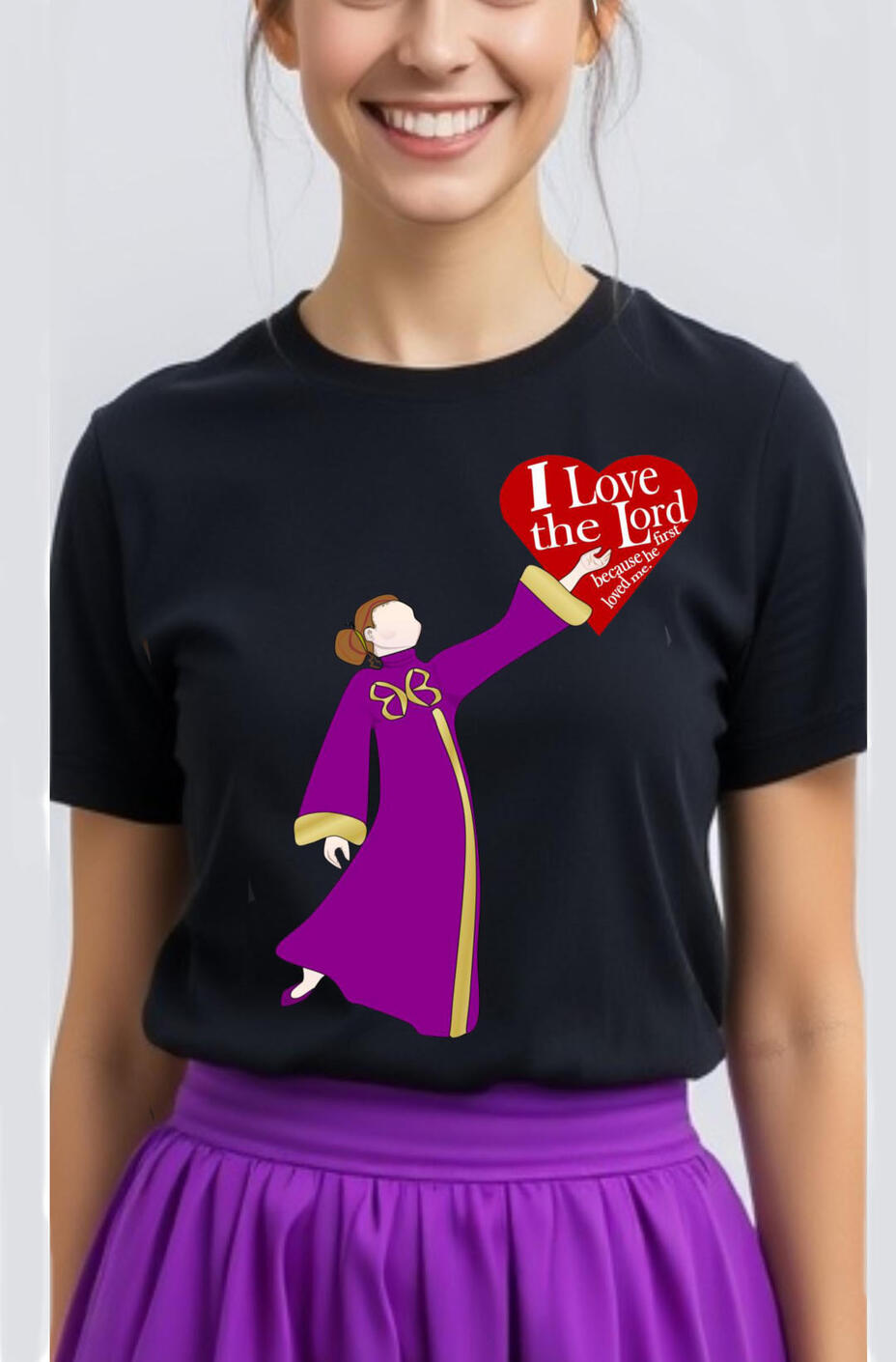 I Love The Lord Women's, Girl's Christian T-shirt. Featuring a female dancer wearing a purple and gold liturgical attire, holding a heart with the words, "I Love The Lord."